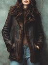 Women's brown shearling leather jacket close-up